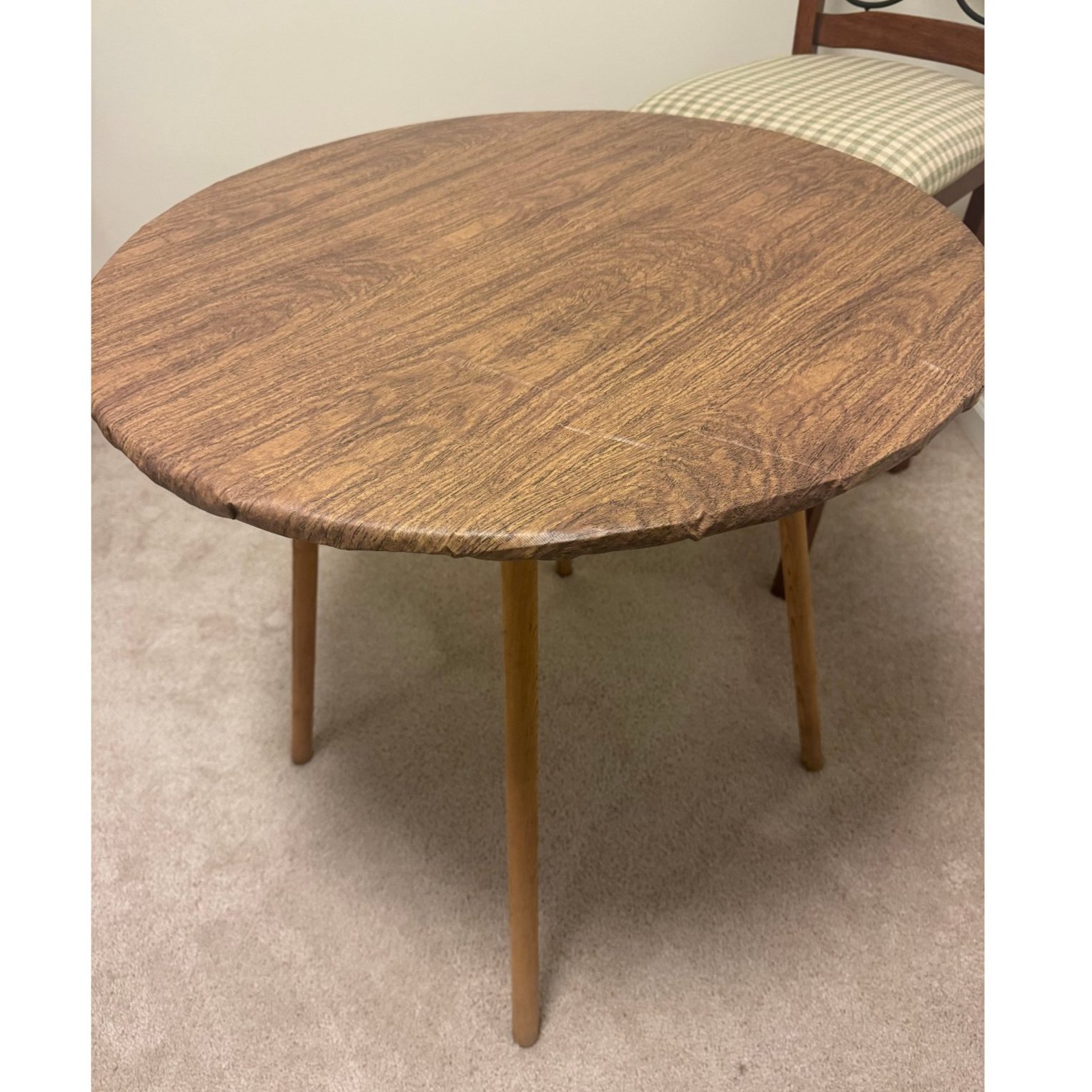 Round Accent Dining Table with Tapered Wood Legs and Wood Grain Fitted Cover