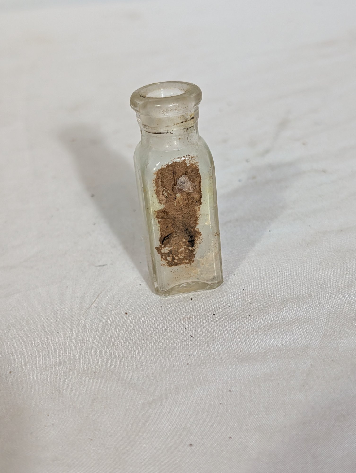Antique Embossed Glass Medicine Apothecary Bottle with Figural Base